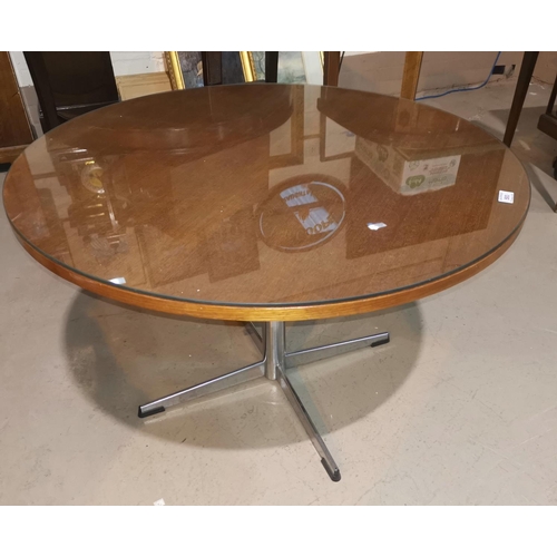 593 - A 1960's Danish teak coffee table with circular top, on chrome legs, by Frem Røjle
