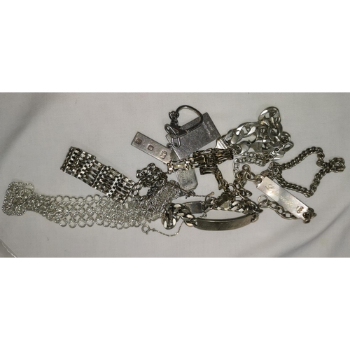314 - A quantity of white metal jewellery bracelets and chain, 9.5 ozt