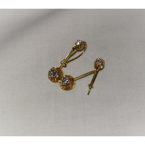 340 - An early 20th century pair of yellow metal drop earrings, each set 2 old cut diamonds, unmarked, tes... 