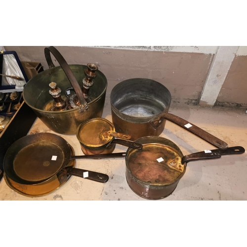 421 - A brass jam pan; 3 19th century copper saucepans and lids; a similar frying pan; 2 Sheffield plate e... 