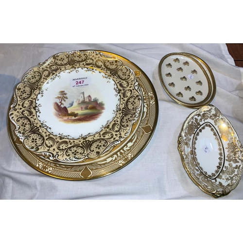 247 - A Victorian pair of dessert plates hand painted with landscapes; 19th century decorative plates