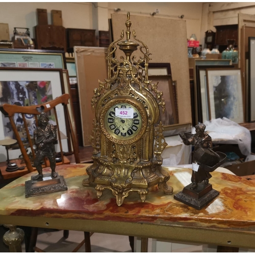 452 - A mantel clock in 19th century style gilt brass case; a pair of 19th century bronzed figures:  male ... 