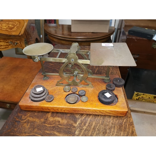 461 - A set of large brass postage scales on oak plinth, with weights; 2 19th century prints of game birds