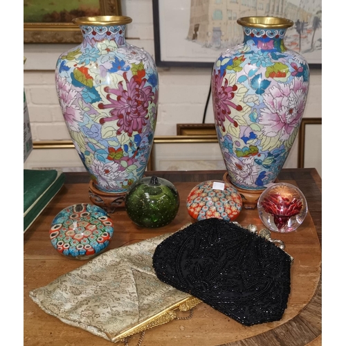 486 - A modern pair of floral cloisonné vases; 2 evening bags; 4 glass paperweights