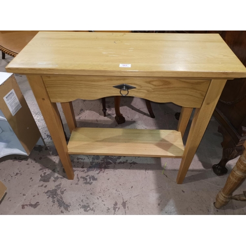 583 - A modern light oak 2 tier hall/side table