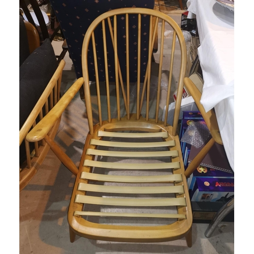 655 - An ercol lightwood low seat armchair - frame only