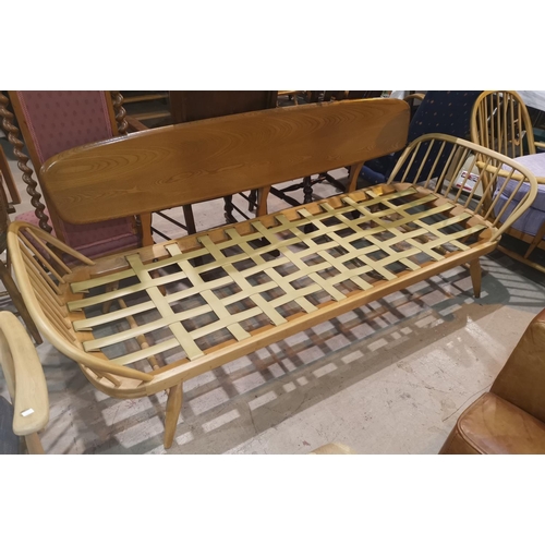 658 - A 1960's Ercol lightwood day bed / studio bedframe, length 200cm