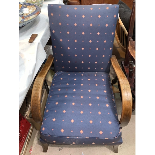 572 - A 1930's open armchair, cable sprung, blue pattern fabric