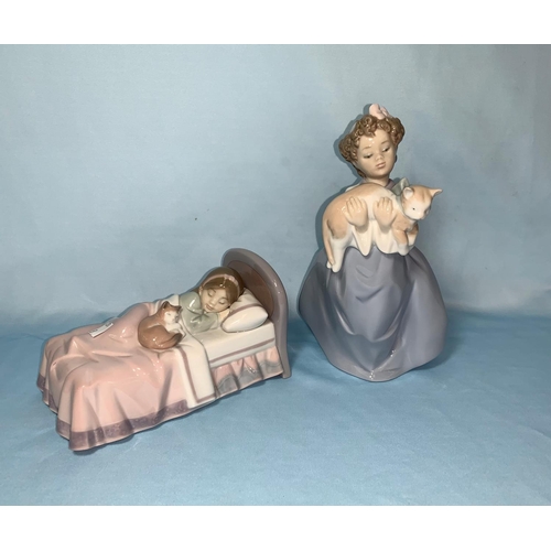 38 - Boxed Lladro figure - girl with cat, Lladro group girl in bed