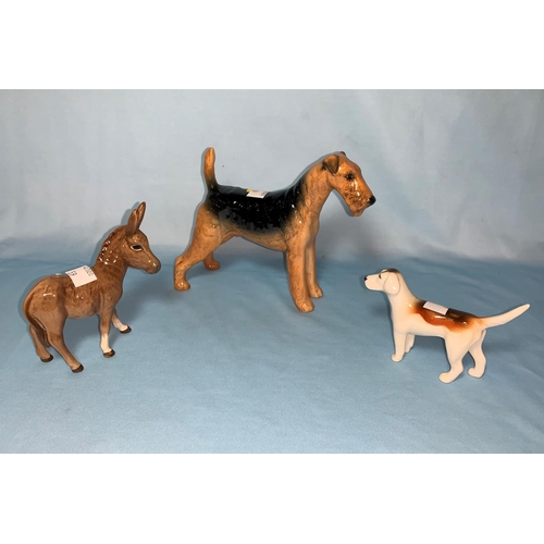 59 - 4 Beswick animals - Bald Eagle, Airdale Terrier, Donkey, Hound