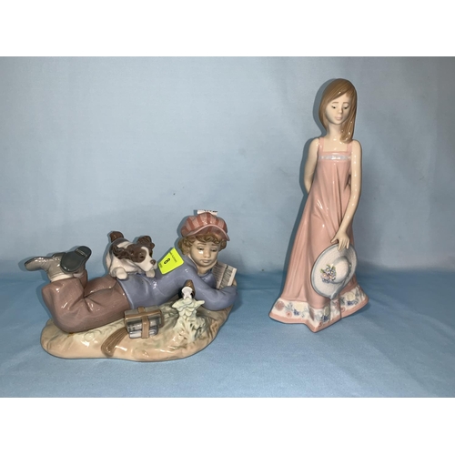 8 - A Lladro group reclining boy & dog L18cm; a Lladro figure of girl holding sun hat Ht 20cm