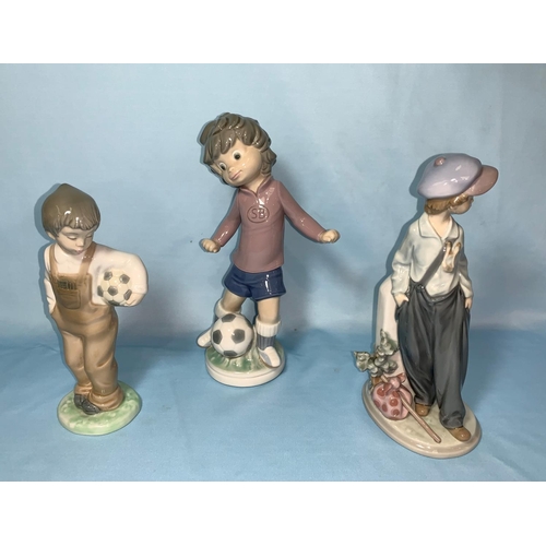 85 - 2 Lladro boy figures - footballer & boy with sack; Nao boy footballer