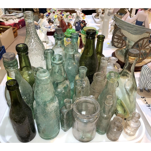 134 - A collection of vintage bottles, jars etc