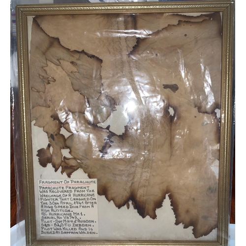 748 - A framed section of parachute recovered from the wreckage of a Hurricane Fighter that crashed 1941