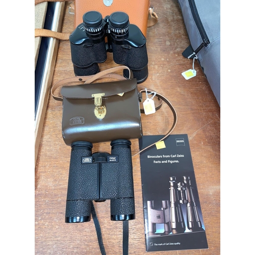 765 - A pair of Carl Zeiss Dialyt 8 x 30B field glasses, ER case and a pair of Boots binoculars