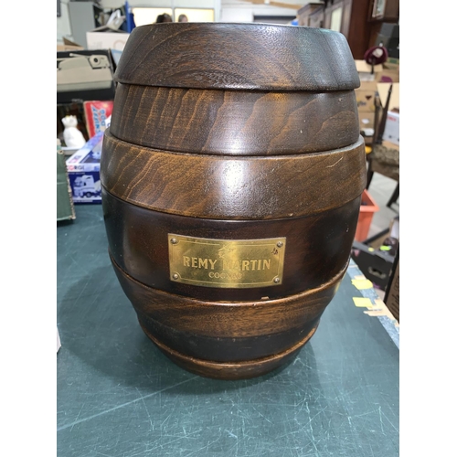 804 - A Remy Martin barrel containing games