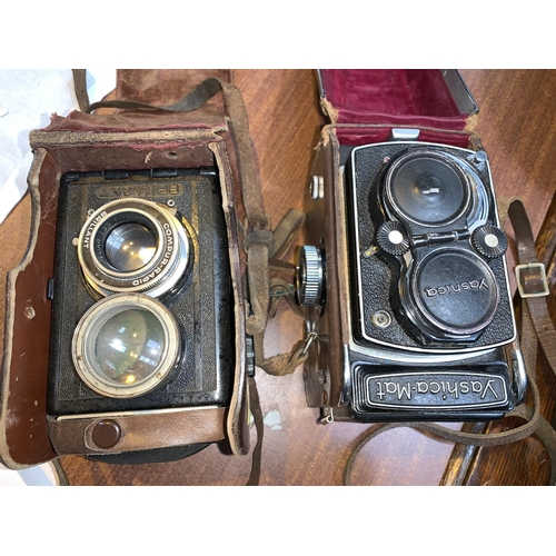 751 - a YASHICA-MAT TLR camera in leather case with accessories and another similar camera