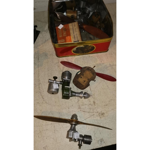 276 - 4 model aircraft engines with various propellers etc