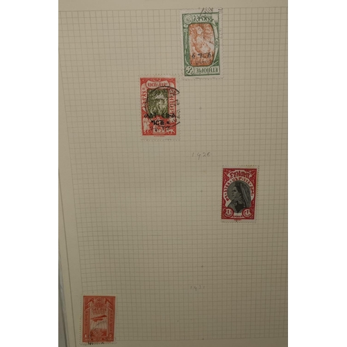 365 - A STRAND looseleaf album with collection of stamps