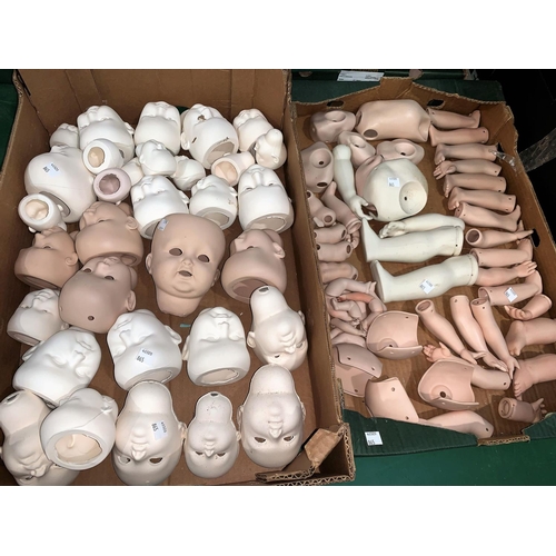 865 - A large selection of unmade doll parts etc