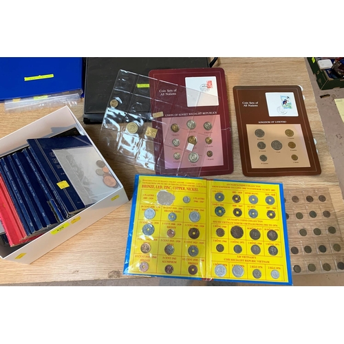 439 - A selection of coin folders and coins