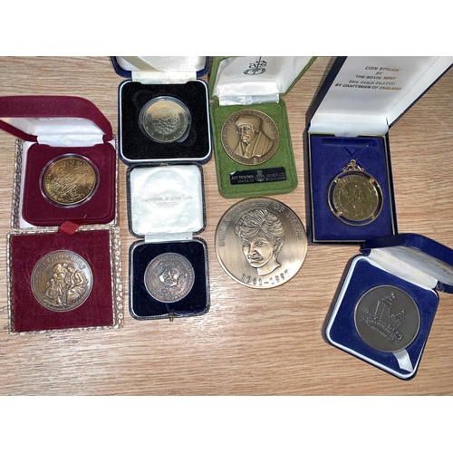 443 - A Florist's silver medal; various bronze medals etc