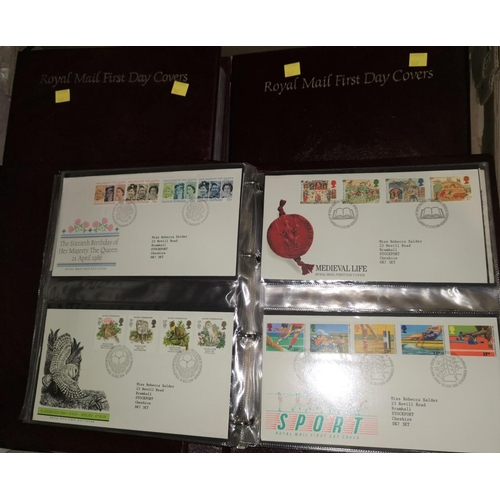 347 - Four albums of GB Royal Mail FDC's, a few packets of mint commemorative stamps