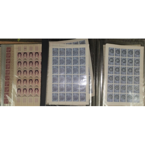 412 - Two albums of half sheets of various British stamps