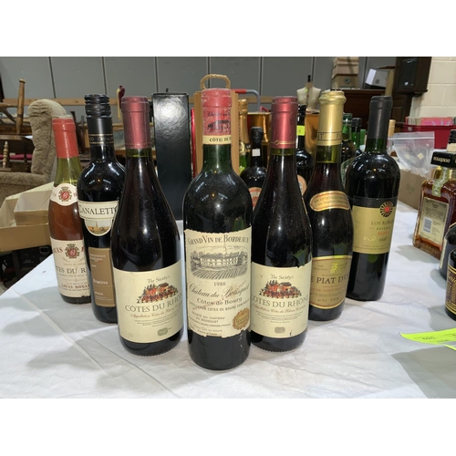 524 - A bottle of Grand Vin De Bordeaux Cotes de Bourg 1986 a selection of red wine etc