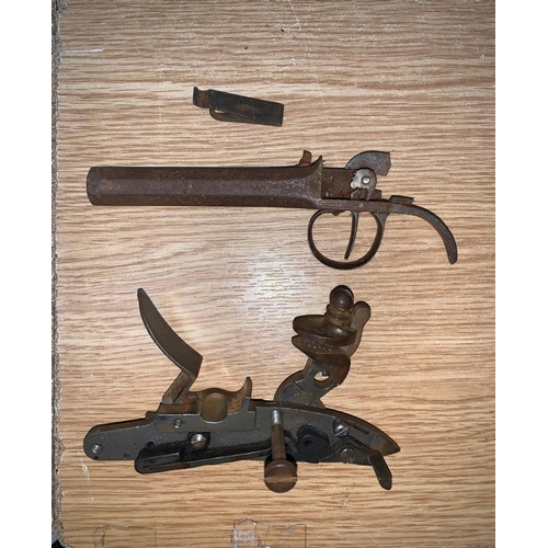 745 - A Tower flintlock action with etched crown stamped GR, a French pistol barrel a.f. and a rifle barre... 