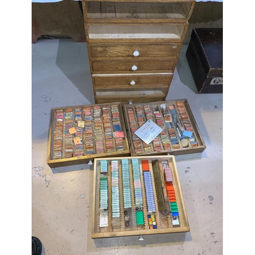 249 - A section of stacking drawers containing wristwatch balance stock, main spring, glass and other part... 