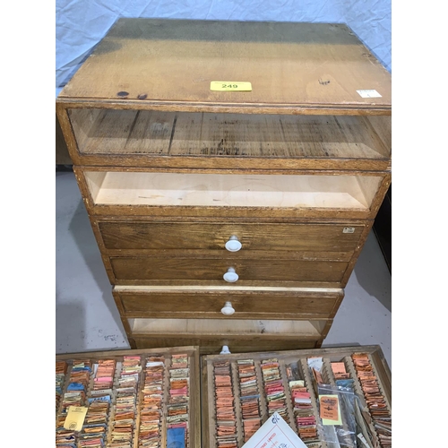 249 - A section of stacking drawers containing wristwatch balance stock, main spring, glass and other part... 