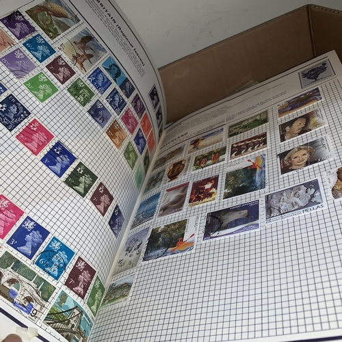 323 - A quantity of stamps in albums