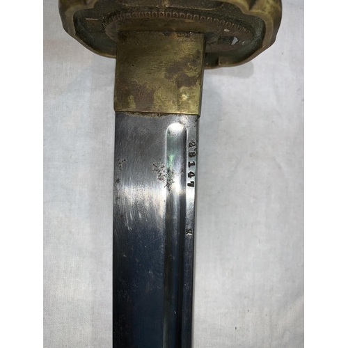 750 - A World War two Japanese katana with metal scabbard and metal alloy handle blade numbered 28147