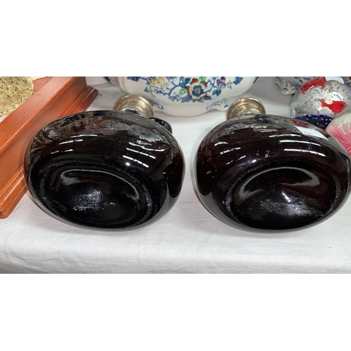 82 - A pair of 19th century glass claret jugs, a pair of covered tureens, a DUNVILLE'S match striker etc