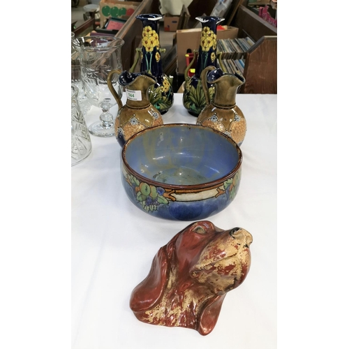 144 - A Doulton Lambeth fruit bowl, a pair of Royal Doulton stone ware ewers, a pair of Minton Art Nouveau... 