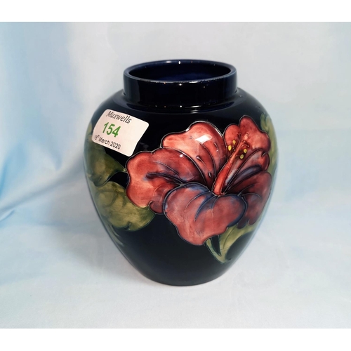 154 - A Moorcroft ovoid vase decorated with tiger lilies on blue ground, 14 cm