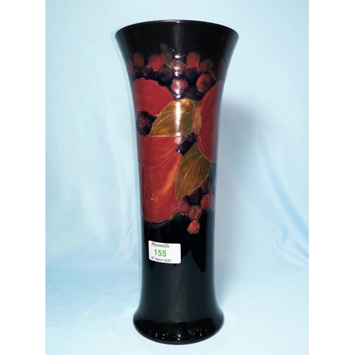 155 - A Moorcroft pottery pomegranate vase of cylindrical form with everted rim, 32 cm (rim restored)