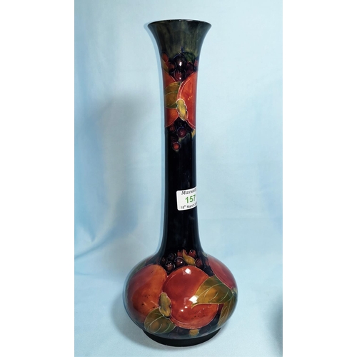 157 - A Moorcroft pottery pomegranate vase of bulbous form with tall neck with everted rim, 33 cm