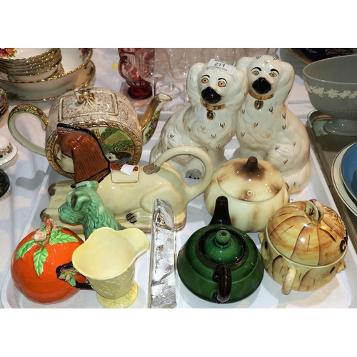 211 - A Clarice Cliff marmalade pot; a pair of Beswick spaniels; a teapot; other decorative ceramics