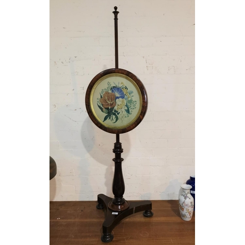 605 - A Victorian rosewood pole screen with circular framed panel containing a contemporary watercolour of... 