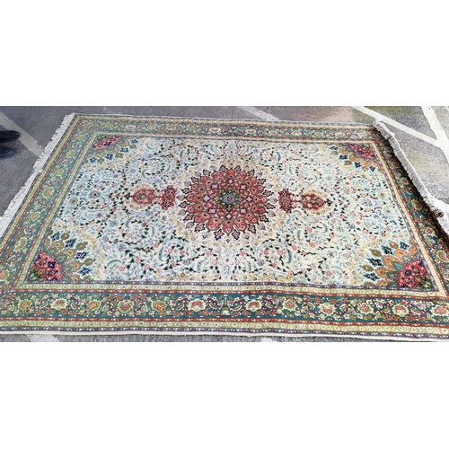 627 - A modern finely hand knotted Persian carpet in the Kashan style, cream ground with multiple border a... 