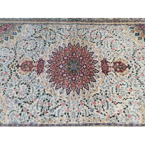 627 - A modern finely hand knotted Persian carpet in the Kashan style, cream ground with multiple border a... 