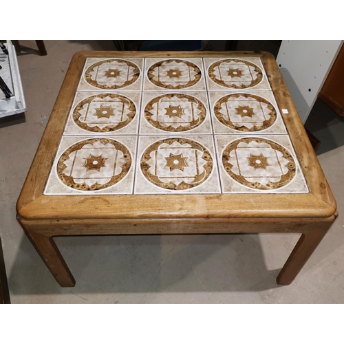 650 - A 1960's G-Plan 2 tier rectangular coffee table; a tile top coffee table