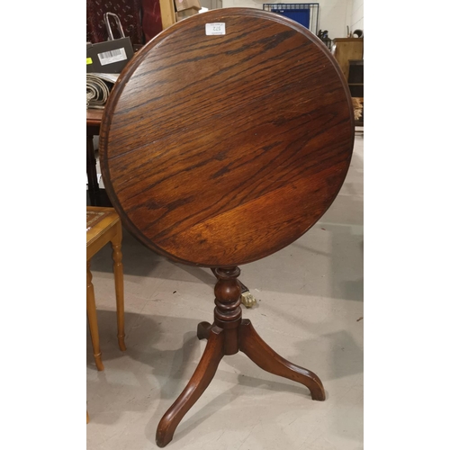 572 - An oak and mahogany circular pedestal