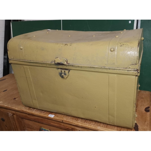 629 - A large yellow tin trunk