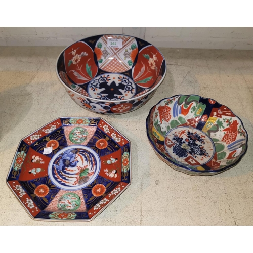 262 - Two late 19th/early 20th century Imari bowls, diameter 25/19 cm; an octagonal dish, diameter 22 cm