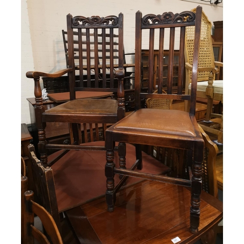 564 - A 1930's set of oak Carolean style dining chairs