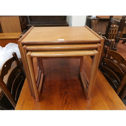 583 - A 1960's nest of 3 teak tables