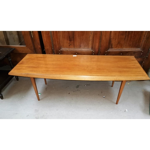 584 - A Gordon Russell teak coffee table with shaped top